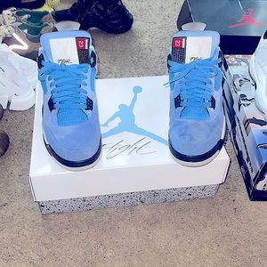 Selling: air Jordan 4 Retro,color:university blue/black,size: 12..
